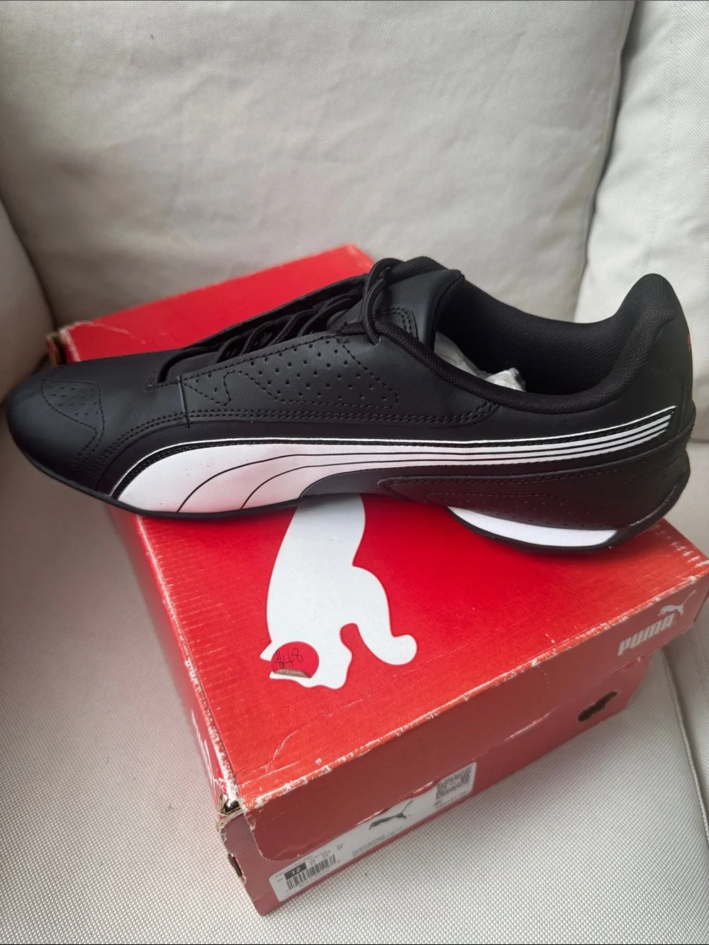 Puma Men’s Black Sneaker with White Formstrip and Red Logo